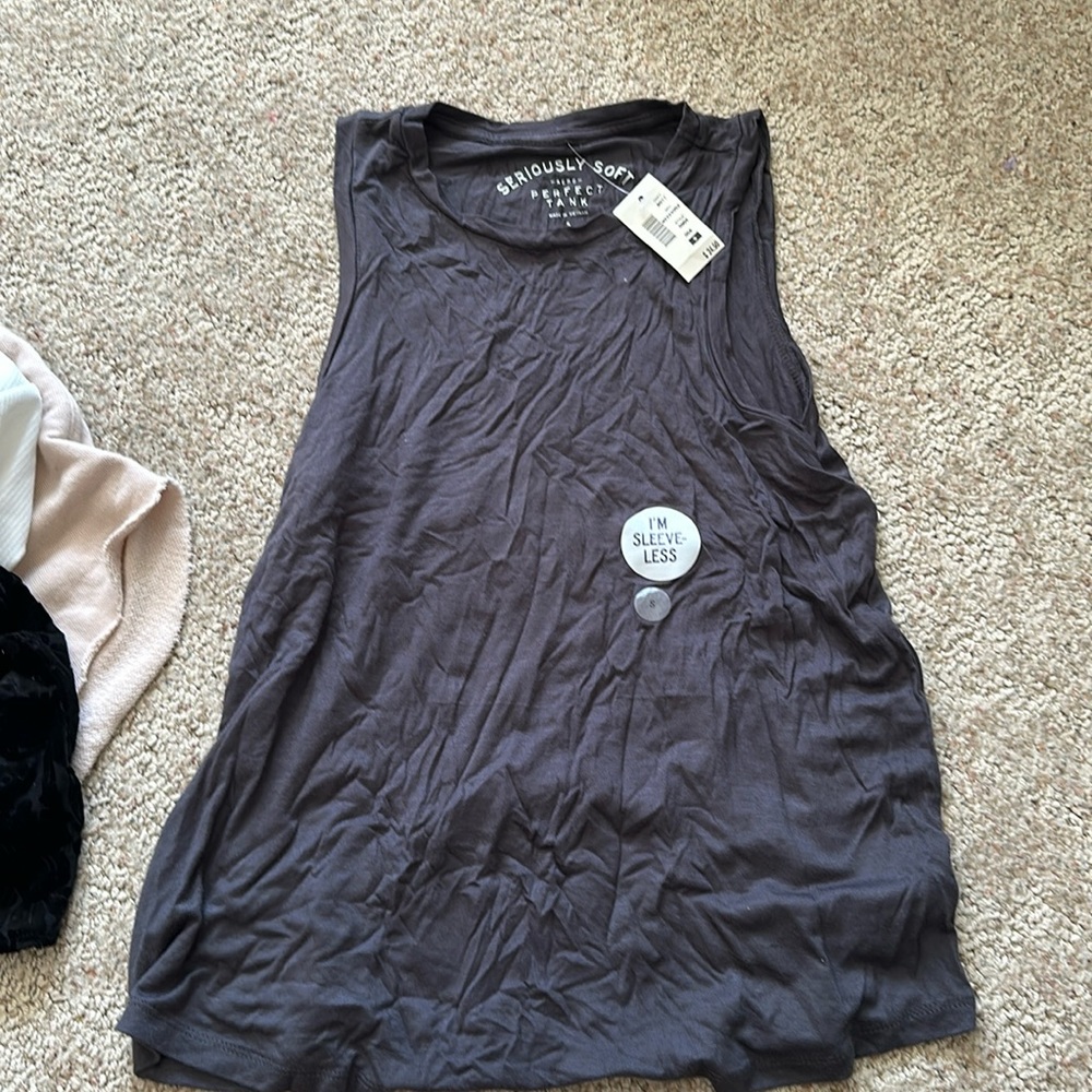 Brand new sleeveless tee